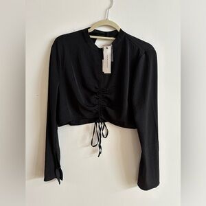Top shop black top, very cute cropped long sleeves top. New